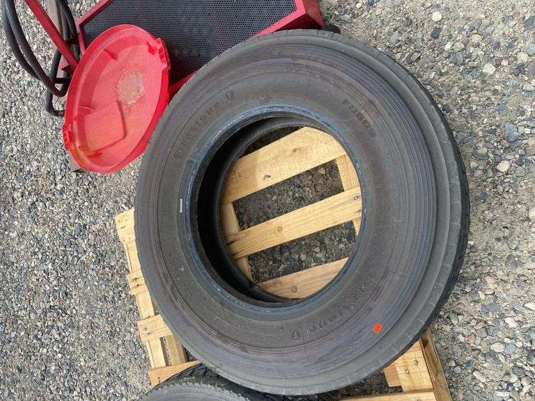 Pallet of (4) Semi Truck Tires - Americus, Dunlop, Bridgestone