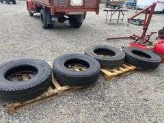 Pallet of (4) Semi Truck Tires - Americus, Dunlop, Bridgestone