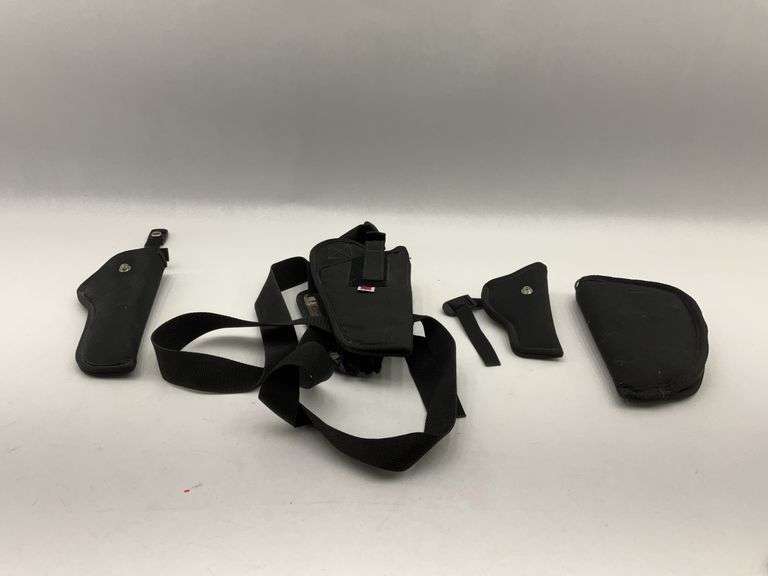 Lot of Black Gun Holsters image