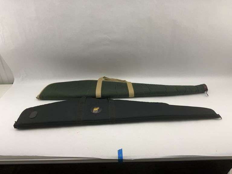 Two Gun Cases: Green Canvas and Black with Buck Logo image