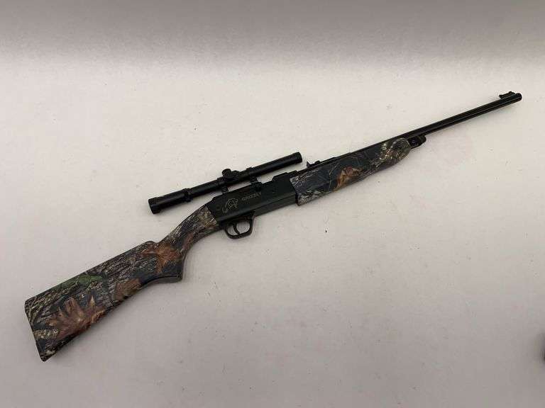 Grizzly Air Rifle with Scope - Camo Stock image
