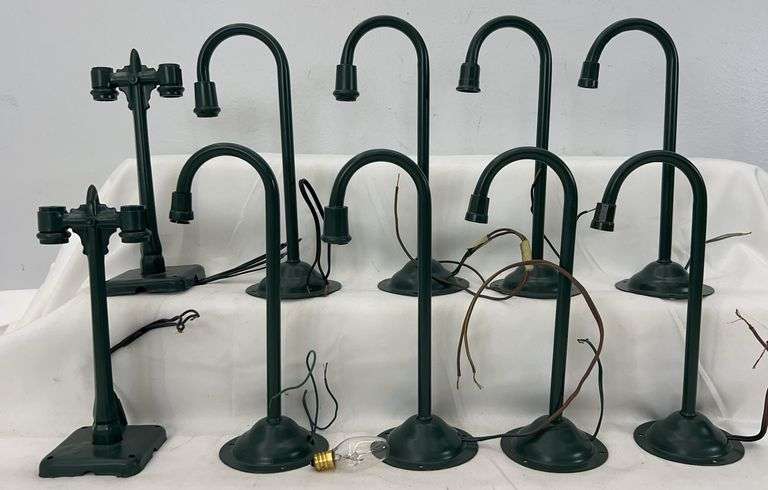 Ten tinplate metal lamp posts, eight gooseneck and two double arc image