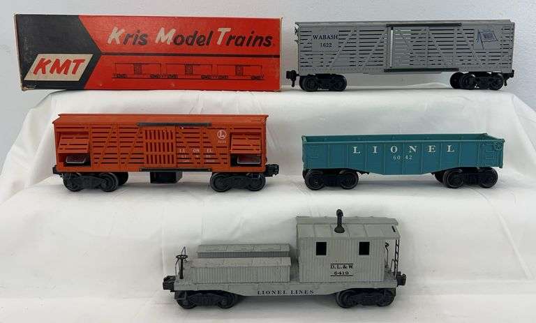 Postwar Lionel O Gauge 6042 gondola, 3656 stock, 6419 DL&W work caboose, KMT 1622 Wabash stock image