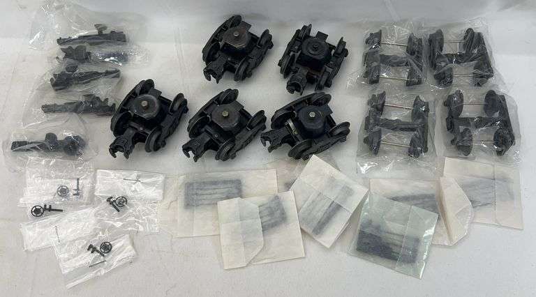 Postwar Lionel O Gauge truck assemblies, modern truck assemblies, modern couplers, new plastic trim image