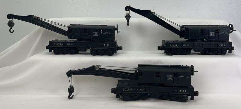 Three postwar Lionel O Gauge 2460 operating Bucyrus Erie cranes w/orig. hooks image