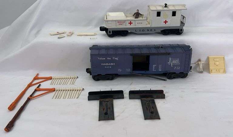 Postwar Lionel O Gauge 3424 Wabash operating brakeman car and 6814 Rescue Unit caboose image