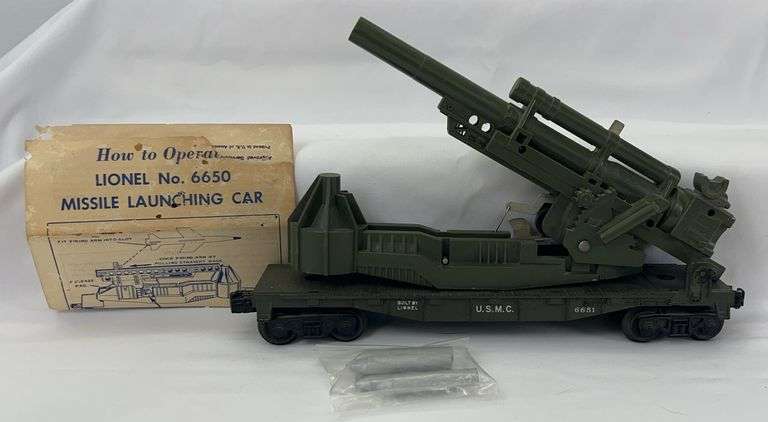 Postwar Lionel O Gauge 6651 U.S.M.C. Cannon Car w/six shells image
