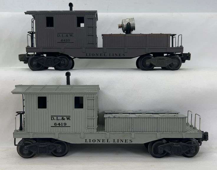 Postwar Lionel O Gauge D.L.&W. 6419-75 wrecking caboose and 6420 searchlight wrecking caboose image