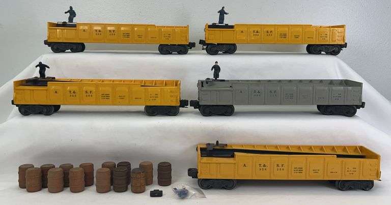 Postwar Lionel O Gauge 3562-25 and four 3562-50 AT&SF operating barrel cars 14 barrels image