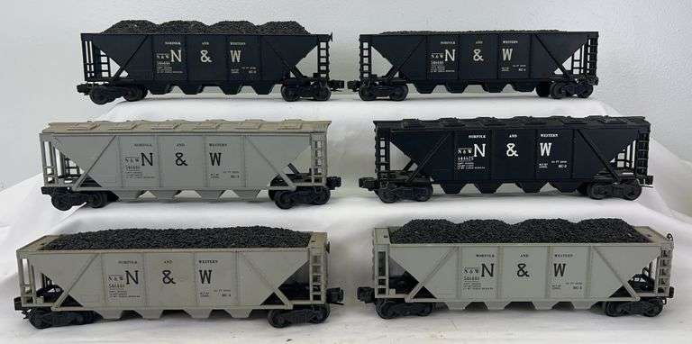 Postwar Lionel O Gauge two 6446 black, three 6446 gray, one 6446-25 hoppers image