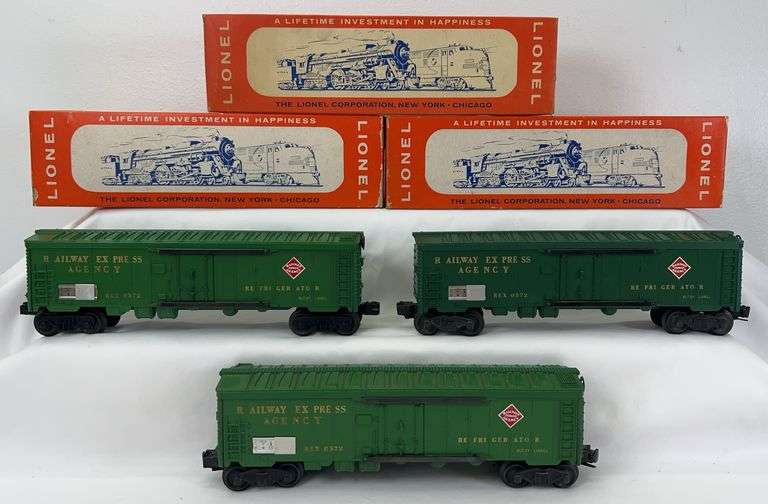 Three postwar Lionel O Gauge 6572 Railway Express Car in original boxes image