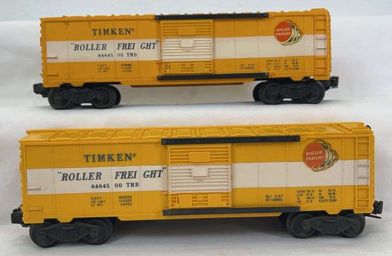 Two postwar Lionel O Gauge 6464-500 Timken type IIb painted yellow type IIb un-painted yellow image
