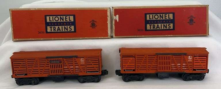 Two postwar Lionel O Gauge 3656 operating cattle cars in original boxes image