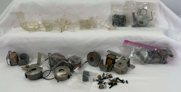 Postwar Lionel O Gauge F-3 and other diesel locomotive parts windshields motors battery holders horns More image