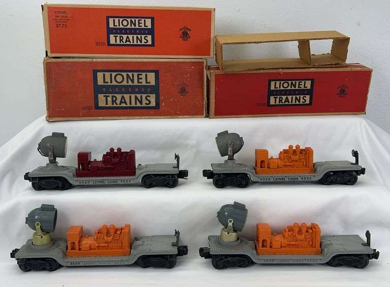 Group of postwar Lionel O Gauge searchlight cars two 3520 two 6520 three original boxes, one insert image