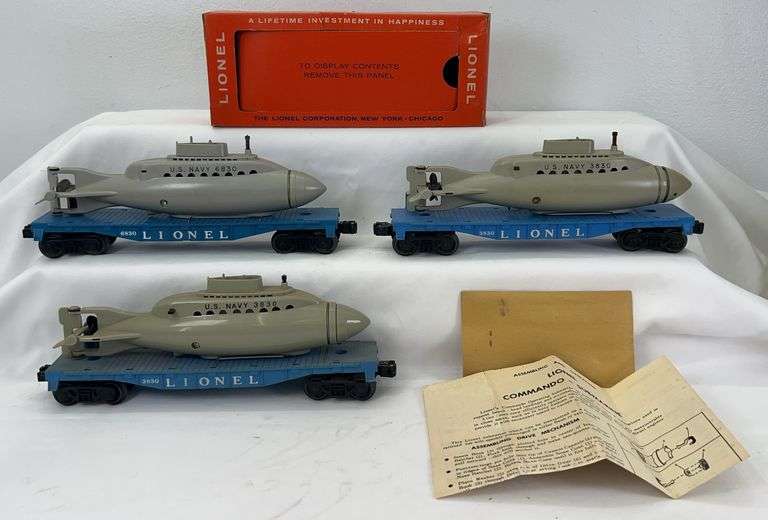 Postwar Lionel O Gauge two 3830 flat car w/operating submarine w/one box, one 6830 flat car w/submarine image
