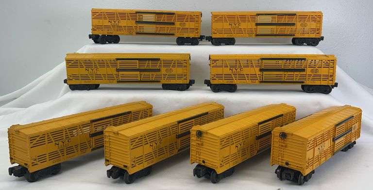 Eight postwar Lionel O Gauge 5356 NYC stock cars painted and unpainted doors image