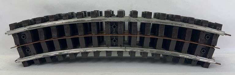 Banded bundle of postwar Lionel O Gauge Super O No. 31 curved track shiny and fresh from Master Carton image