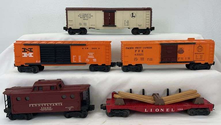 Postwar Lionel O Gauge 6468-25 NH Automobile, 6352 PFE Ice, 6264 flat w/ties, 3662 Milk, 6417 PRR porthole image