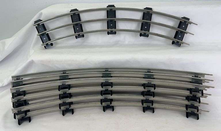 Five modern era sections of MTH Standard Gauge curved track with five ties image