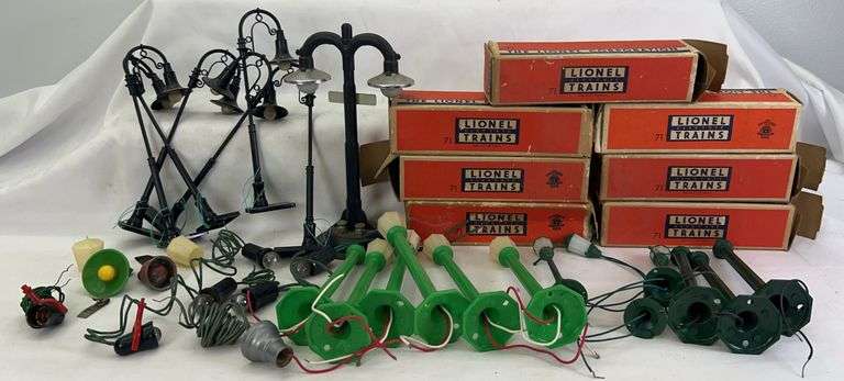Seven postwar Lionel O Gauge 71 lamp posts in original boxes, fifteen other Lionel lamps, Marx lamps image
