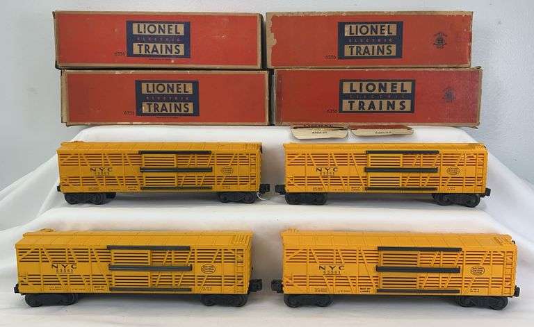 Four postwar Lionel O Gauge 6356 NYC Stock Cars in original boxes image