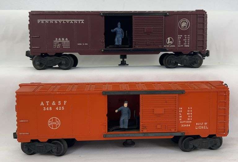 Postwar Lionel O Gauge 3484 PRR and 3484-25 AT&SF operating box cars image