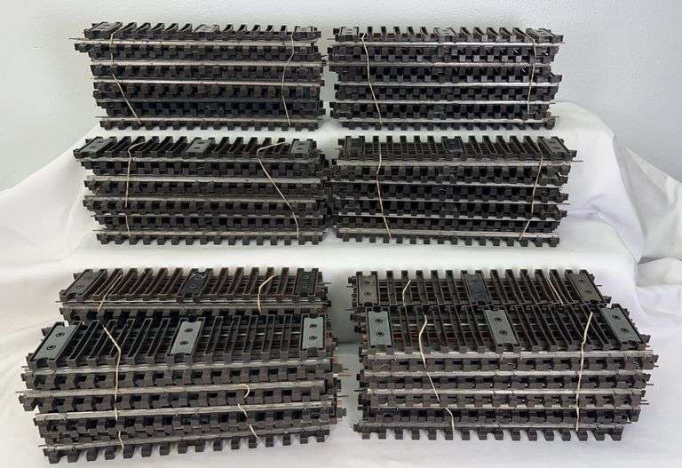 Eighty sections of postwar Lionel No. 32 Super O gauge straight track, all inspected image