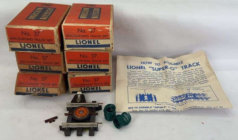 Postwar Lionel O Gauge Super O group of 37 uncoupling track set boxes, uncoupler, 90 control button, 81-32 wire coils, 31-7 image