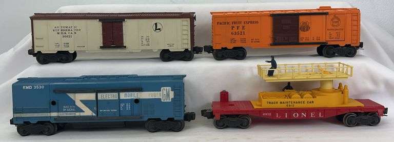Postwar Lionel O Gauge 3530, 6812, 6352 and 3662 bar end truck freight image