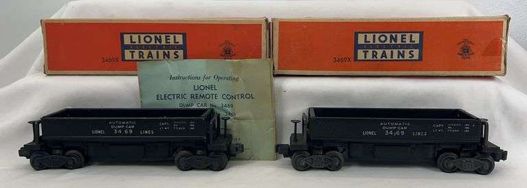 Postwar Lionel O Gauge two 3469X automatic dump cars in original boxes with an instructions sheet image