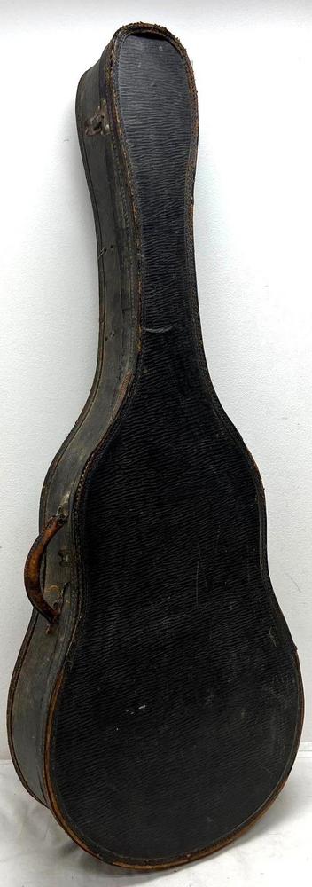 Older leather bound leather handled acoustic guitar case