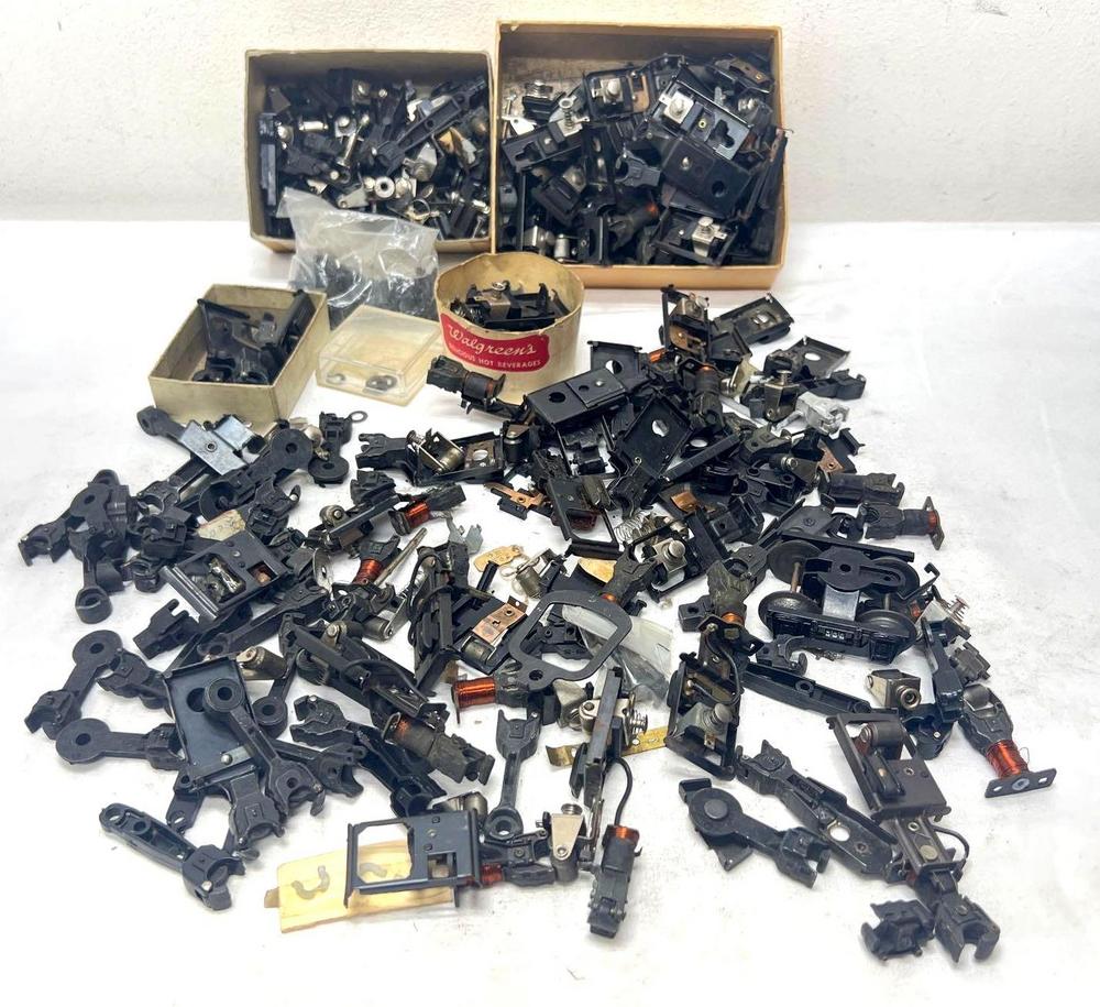 Postwar Lionel O Gauge die-cast couplers rollers more