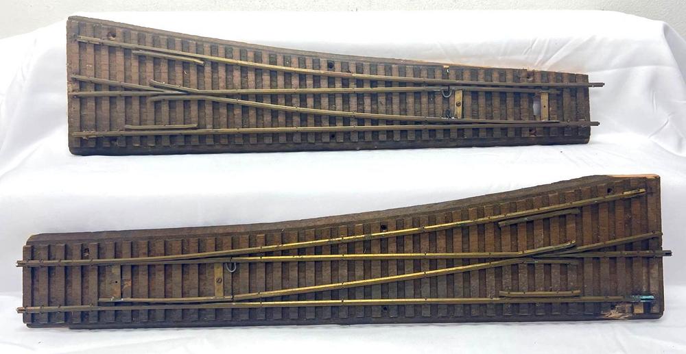 Left and Right wide radius two rail brass switches outside third rail?
