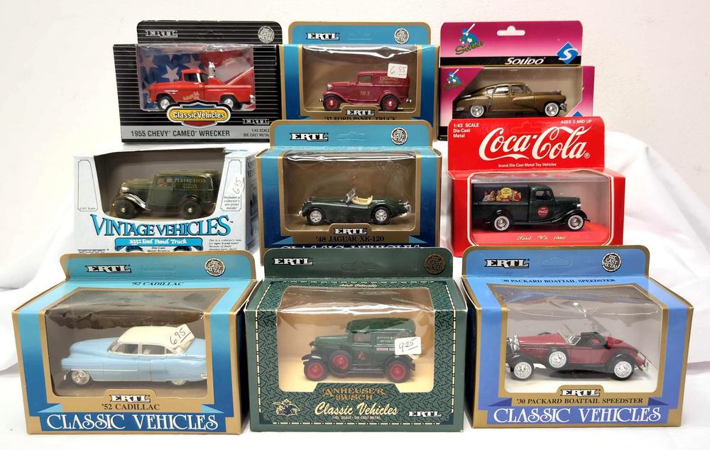 Seven Ertl and Two Solido in original packages 1:43