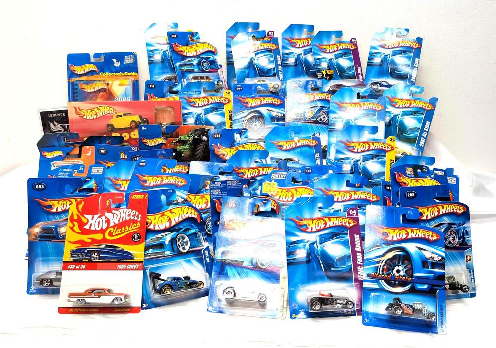 Fifty-Six Hot Wheels die-cast cars on card w/variations