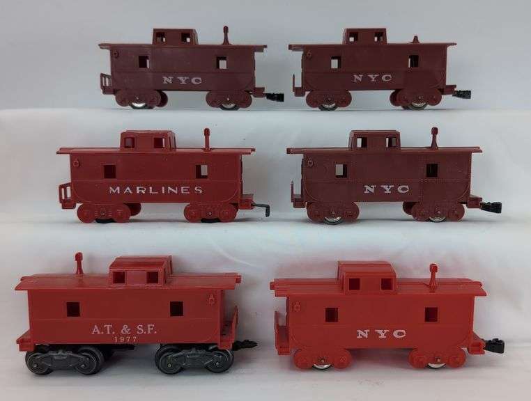 Lot of twelve Marx O Gauge Cabooses NYC, Union Pacific, AT&SF, Penn Central, Marlines