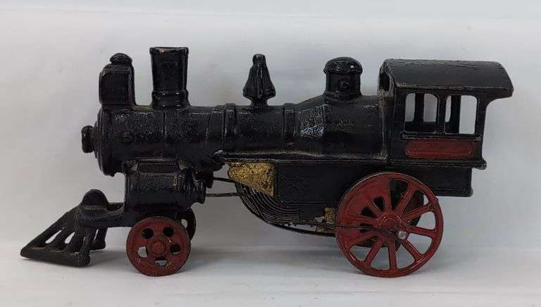 Very early cast iron Ives? 2-2-0 steam locomotive w/brass clock work key wind motor w/wire drive rods floor toy image