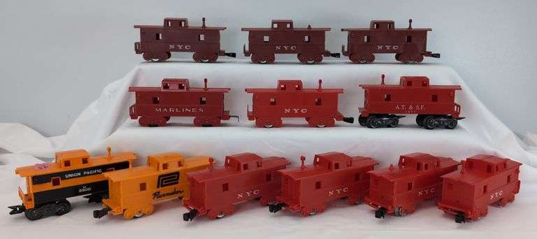 Lot of twelve Marx O Gauge Cabooses NYC, Union Pacific, AT&SF, Penn Central, Marlines image