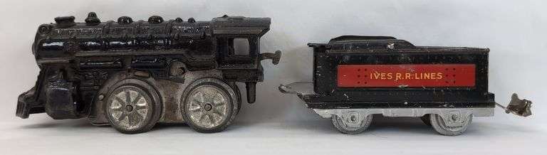 Prewar cast iron key wind loco with IVES R.R. Lines lithographed tinplate tender image
