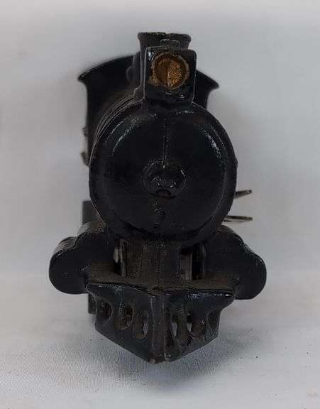 Prewar cast Iron O Gauge key wind steam locomotive with snap in motor