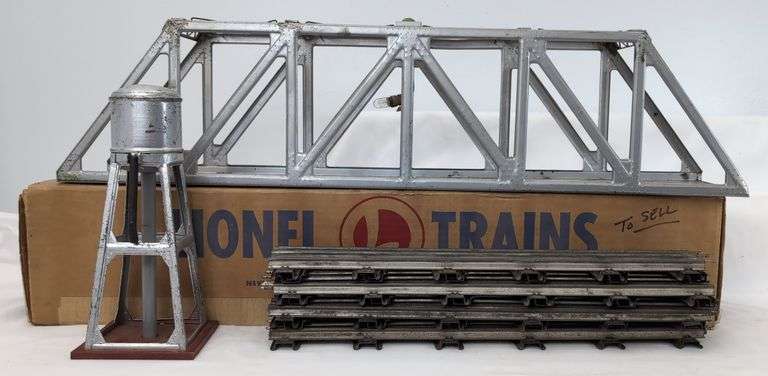 Lionel 315 illuminated bridge, 317 bridge in box, 93 water tower, O72 straight track image
