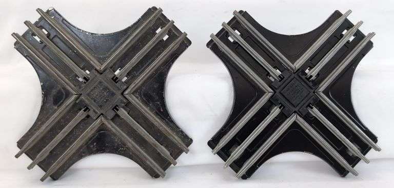 Two pairs of Lionel O42 manual control switches, two O20 90 degree crossovers, 1014 and 1016 transformers