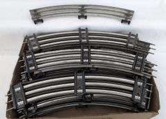 Large Lot of Postwar Lionel standard O Gauge straight (24) and curved (29) shiny rail track