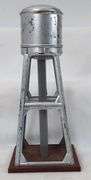Lionel  315 illuminated bridge, 317 bridge in box, 93 water tower, O72 straight track