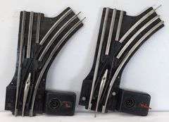 Two pairs of Lionel O42 manual control switches, two O20 90 degree crossovers, 1014 and 1016 transformers