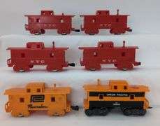 Lot of twelve Marx O Gauge Cabooses NYC, Union Pacific, AT&SF, Penn Central, Marlines