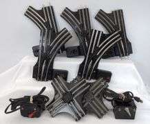 Two pairs of Lionel O42 manual control switches, two O20 90 degree crossovers, 1014 and 1016 transformers