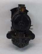 Prewar cast Iron O Gauge key wind steam locomotive with snap in motor