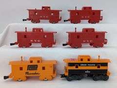 Lot of twelve Marx O Gauge Cabooses NYC, Union Pacific, AT&SF, Penn Central, Marlines